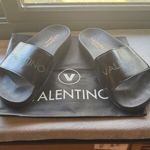 Ladies pre worn Valentino Elegant Black Slides. Size 38. US size 8.